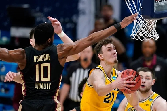 Franz Wagner (21) and Hunter Dickinson (1)