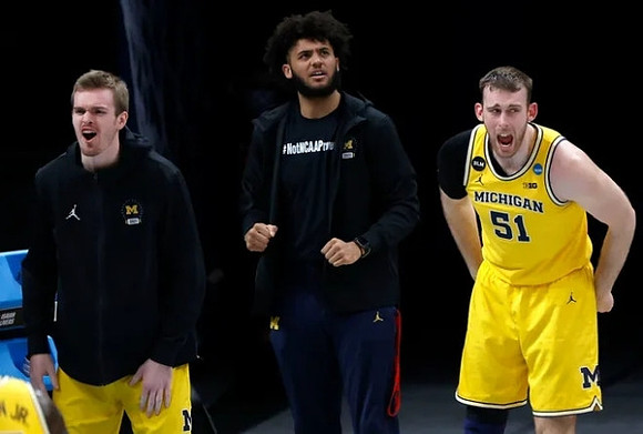 Jaron Faulds (44), Isaiah Livers (2), and Austin Davis (51)