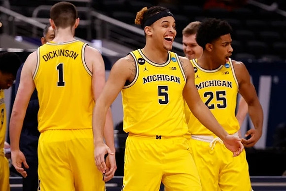 Juwan Howard, Hunter Dickinson (1), Terrance Williams II (5), Brandon Johns Jr. (23), and Jaron Faulds (44)