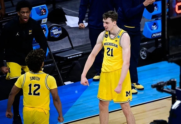 Mike Smith (12), Jace Howard (25), and Franz Wagner (21)