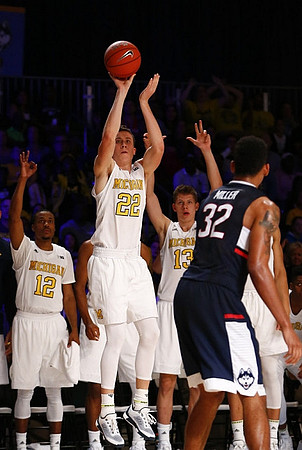 Muhammad-Ali Abdur-Rahkman (12), Duncan Robinson (22), and Moritz Wagner (13)