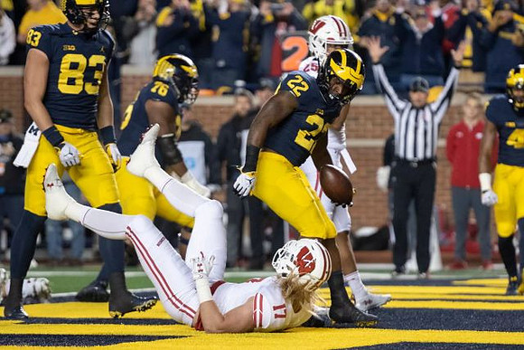 Zach Gentry (83), Juwann Bushell-Beatty (76), and Karan Higdon (22)