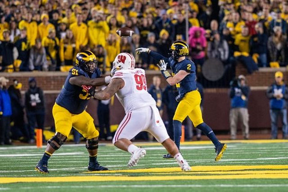 Cesar Ruiz (51) and Shea Patterson (2)