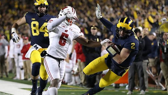 Sean McKeon (84) and Shea Patterson (2)