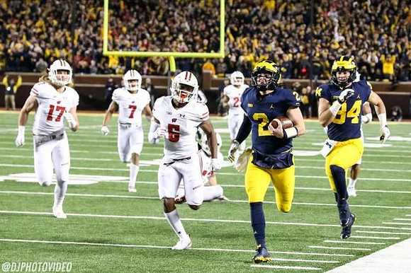 Shea Patterson (2) and Sean McKeon (84)
