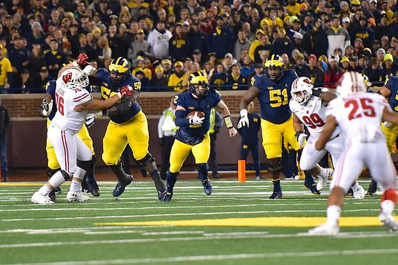 Michael Onwenu (50), Shea Patterson (2), and Cesar Ruiz (51)