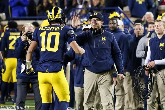 Dylan McCaffrey (10) and Jim Harbaugh