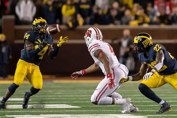 Josh Metellus (14) and David Long (22)