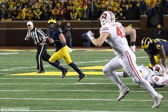 Shea Patterson (2) and Juwann Bushell-Beatty (76)