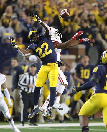 David Long (22) and Devin Bush (10)