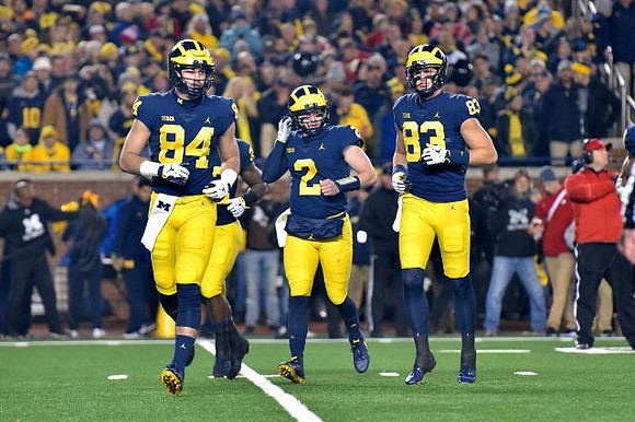 Sean McKeon (84), Shea Patterson (2), and Zach Gentry (83)