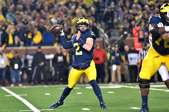 Shea Patterson (2) and Juwann Bushell-Beatty (76)