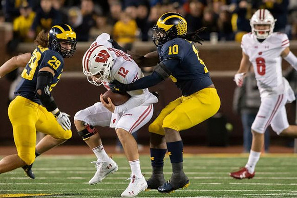 Jordan Glasgow (29) and Devin Bush (10)