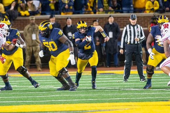 Juwann Bushell-Beatty (76), Michael Onwenu (50), Shea Patterson (2), and Ben Bredeson (74)