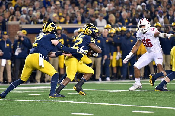 Shea Patterson (2) and Karan Higdon (22)