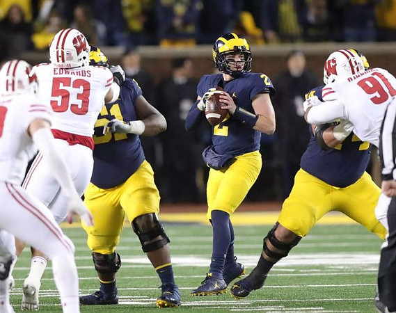 Cesar Ruiz (51), Shea Patterson (2), and Ben Bredeson (74)