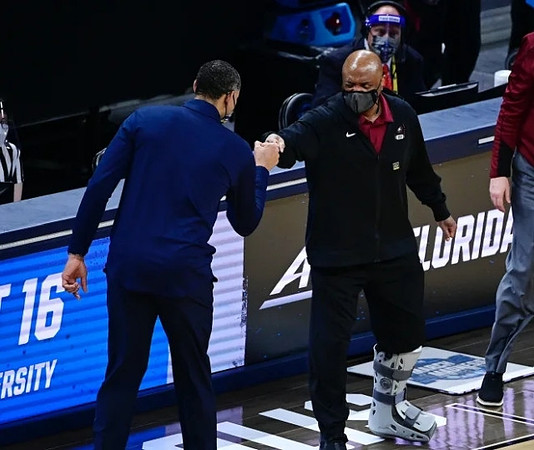 Juwan Howard and Florida State Head Coach Leonard Hamilton
