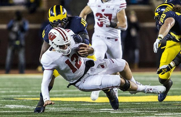Devin Bush (10) and Jordan Glasgow (29)