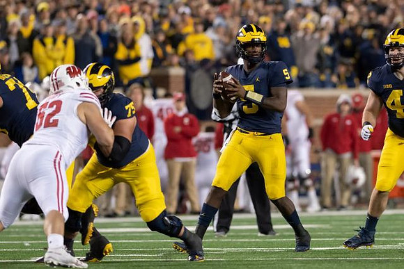 Jon Runyan Jr. (75), Joe Milton (5), and Ben Mason (42)