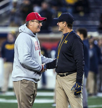 Wisconsin Head Coach Paul Chryst and Jim Harbaugh