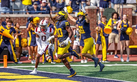 Kalel Mullings (20) and Peyton O'Leary (81)
