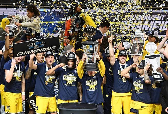 Dusty May, Michigan Team, and Big Ten Tournament Championship Trophy