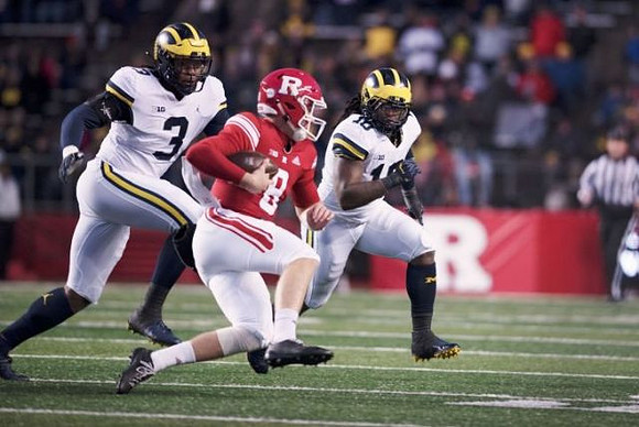 Rashan Gary (3) and Devin Bush (10)