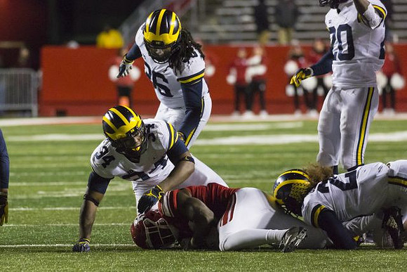 Jordan Anthony (34), Devin Gil (36), J'Marick Woods (26), and Brad Hawkins (20)