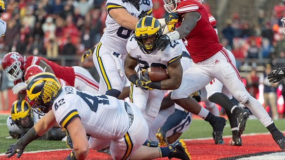 Ben Bredeson (74), Ben Mason (42), Karan Higdon (22), and Sean McKeon (84)