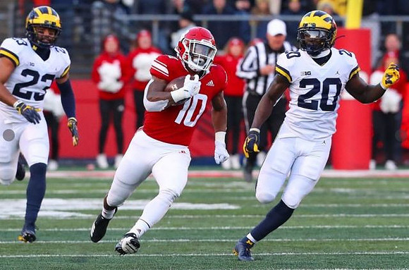 Tyree Kinnel (23) and Brad Hawkins (20)