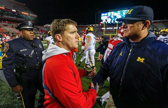 Rutgers Head Coach Chris Ash and Jim Harbaugh