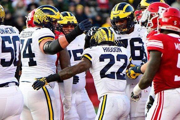 Michael Onwenu (50), Ben Bredeson (74), Jon Runyan Jr. (75), Karan Higdon (22), and Juwann Bushell-Beatty (76)