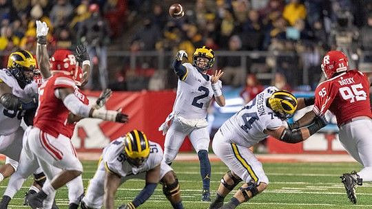 Michael Onwenu (50), Cesar Ruiz (51), Shea Patterson (2), and Ben Bredeson (74)