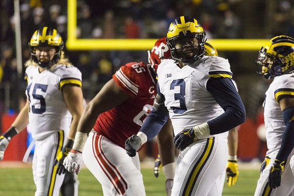Chase Winovich (15) and Rashan Gary (3)