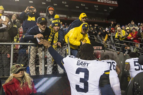 Rashan Gary (3), Juwann Bushell-Beatty (76), and Michael Onwenu (50)