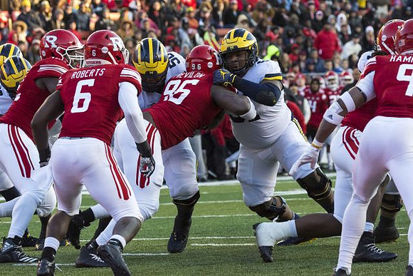 Michael Onwenu (50) and Cesar Ruiz (51)