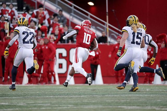 David Long (22), Chase Winovich (15), and Brad Hawkins (20)