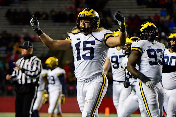 Chase Winovich (15), Aidan Hutchinson (97), Lawrence Marshall (93), and Bryan Mone (90)