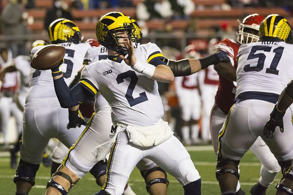 Jon Runyan Jr. (75), Juwann Bushell-Beatty (76), and Shea Patterson (2)