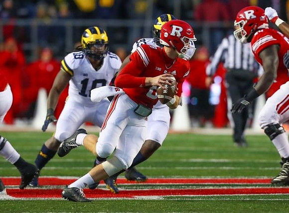 Devin Bush (10) and Lawrence Marshall (93)