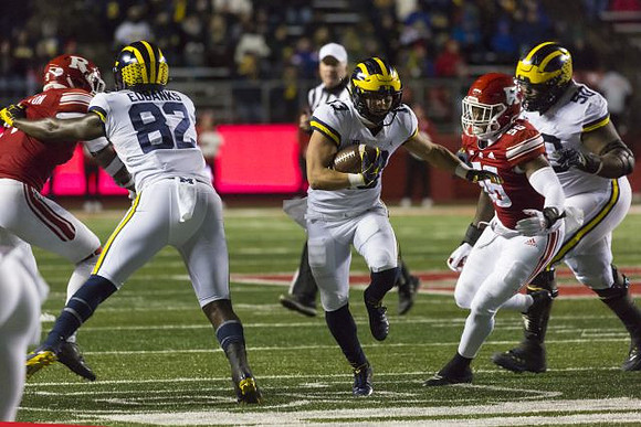 Nick Eubanks (82), Tru Wilson (13), and Michael Onwenu (50)