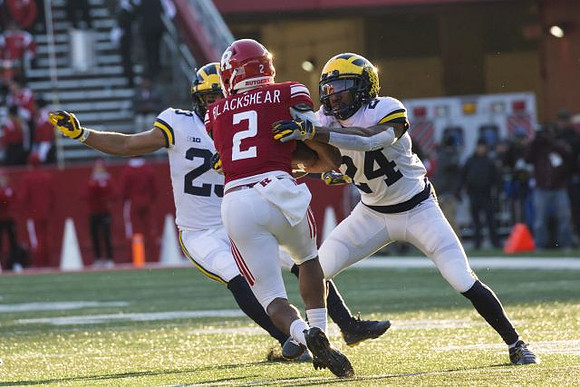 Tyree Kinnel (23) and Lavert Hill (24)