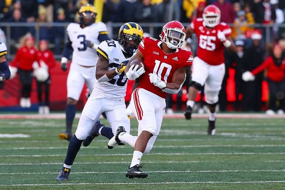 Rashan Gary (3) and Brad Hawkins (20)