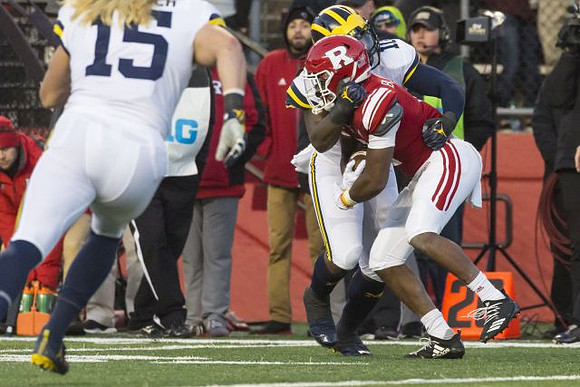 Chase Winovich (15) and Devin Bush (10)