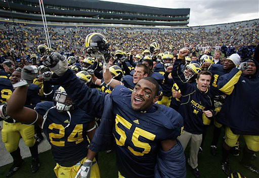 Kevin Grady (24) and Brandon Graham (55)