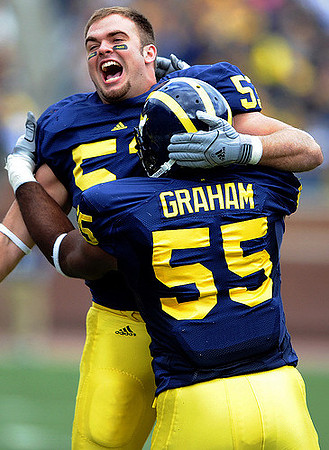 Ryan Van Bergen (53) and Brandon Graham (55)
