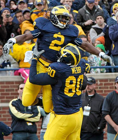 Vincent Smith (2) and Martell Webb (80)