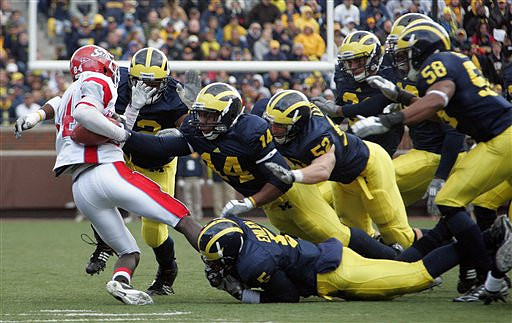 Vladimir Emilien (5), Teric Jones (14), Stevie Brown (3), Kevin Leach (52), and Brandon Herron (58)