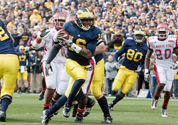 Denard Robinson (16) and Martell Webb (80)