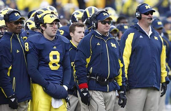 Fred Jackson, Nick Sheridan (8), and Rich Rodriguez